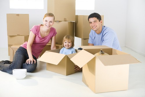 Professional packers handling household items