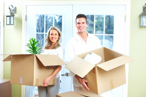 Efficient team managing a moving truck on moving day